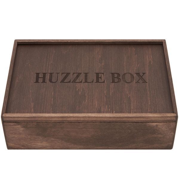 Набір головоломок Huzzle в боксі фото